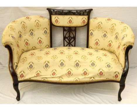 EDWARDIAN MAHOGANY FRAME SOFA
with a central shaped top rail above a padded section with a pierced carved splat below, flanke