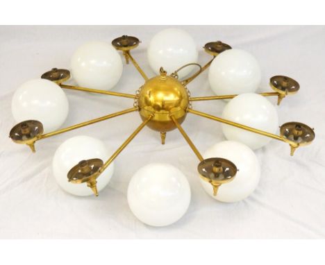 BRASS EIGHT BRANCH CEILING LIGHT
the central body with finial and suspension chain, the arms with pierced pans with finials a