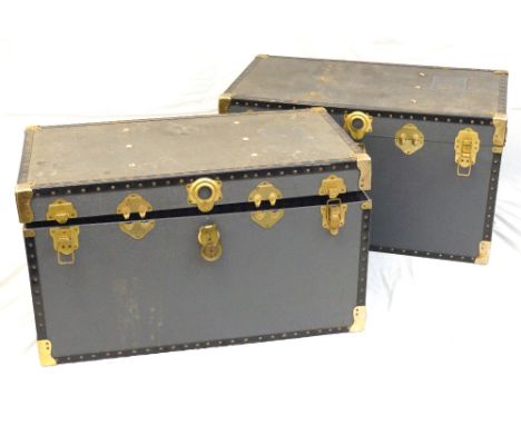 PAIR OF VINTAGE PLYWOOD 'OVERPOND' TRAVEL TRUNKS
metal bound, with carrying handles, 50.5cm high x 91.5cm wide x 51.5cm deep;