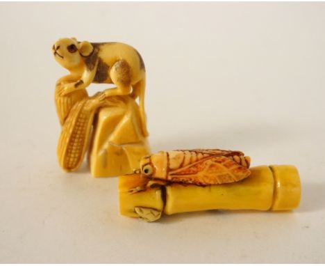 CHINESE CARVED IVORY NETSUKE
of a cicada on a piece of bamboo, 5cm long; and a Chinese ivory netsuke of a rat on a rock eatin