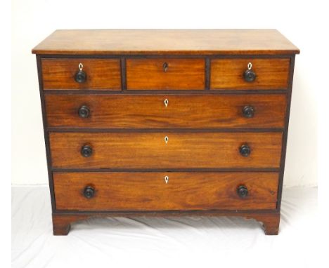 GEORGE III MAHOGANY CHEST OF DRAWERS
with three frieze drawers above three graduated drawers, all with cockbeading and turned