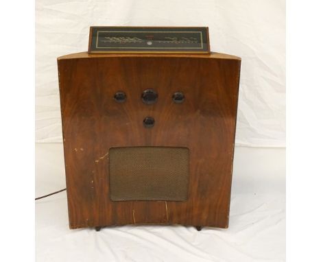 1950's MURPHY 188 RADIOGRAM
with an angled glass front waveband indicating medium and long wave, above a shaped walnut body h