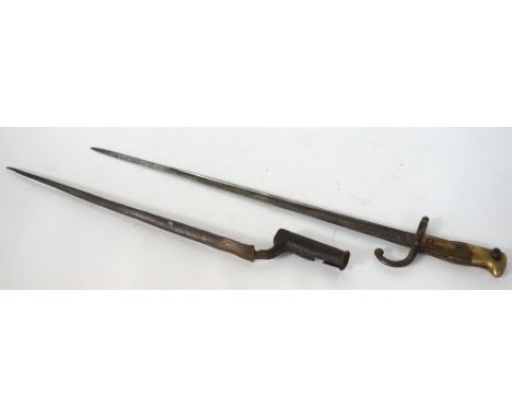 19th CENTURY SOCKET BAYONET
54cm long, and a French model 1874 gras bayonet dated 1876, scabbard lacking (2)