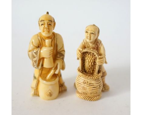 CARVED IVORY NETSUKE
of a man with a pot, 5.2cm high; and an ivory netsuke of a man pouring grain into a bucket 4.8cm high 
