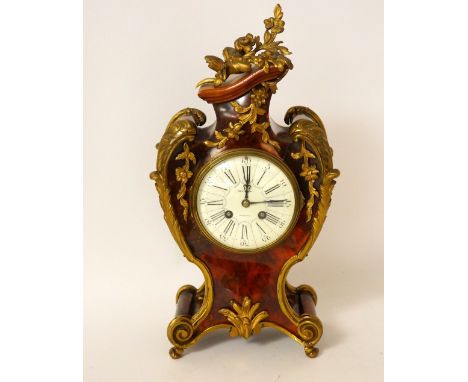 LATE 19th CENTURY ROCOCO STYLE MANTEL CLOCK BY DAVID CRICHTON OF EDINBURGH
the shaped tortoiseshell case with foliate and scr