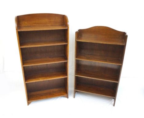 TWO VINTAGE OAK OPEN BOOKCASES
124cm x 61.5cm and 108.5cm x 61.5cm wide respectively, the smaller bookcase has an upper oak a
