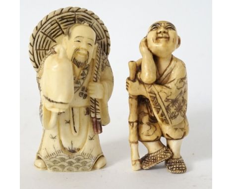CARVED IVORY NETSUKE
of a man resting against his staff thinking, 5.2cm high; and a Chinese ivory netsuke of a man holding a 