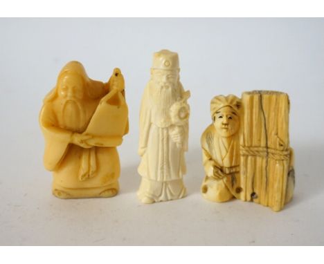 JAPANESE CARVED IVORY NETSUKE
of a woodman, 4cm high; a Japanese ivory netsuke of a man holding a chrysanthemum 5.5cm high; a
