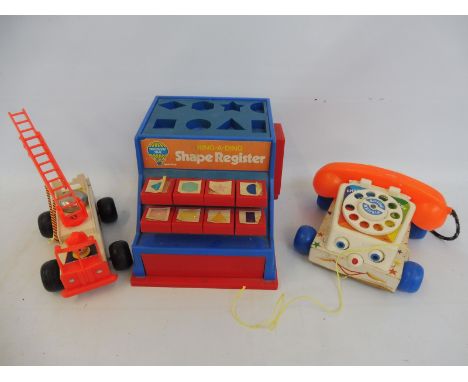 A small quantity of Fisher Price and early learning toys to include telephone, fire engine etc.