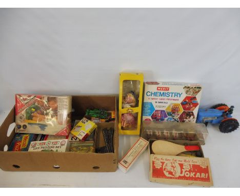 A mixed box of assorted mainly 1960s/1970s toys to include Pelham puppet, Marx tractor, Corgi landau. and others.