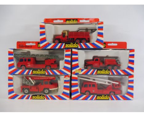 Five boxed Solido fire engines and trucks.