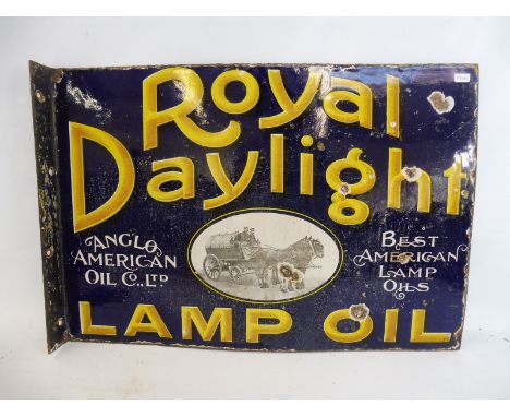 A Royal Daylight Lamp Oil double sided enamel sign with hanging flange, with a clear black and white image to each side of a 