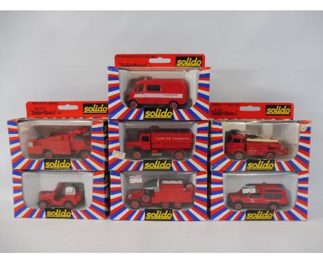 Seven boxed Solido fire emergency vehicles to include Dodge, Iveco etc.