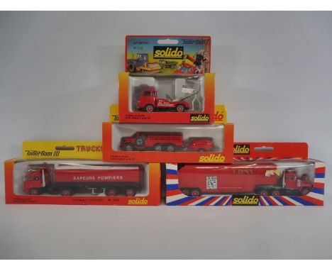 Four boxed Solido fire emergency vehicles, box condition good, to include Dodge, Mack, Renault etc.