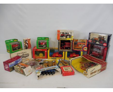 A box of mainly farm vehicles to include Solido, Ertl, Britains and others.