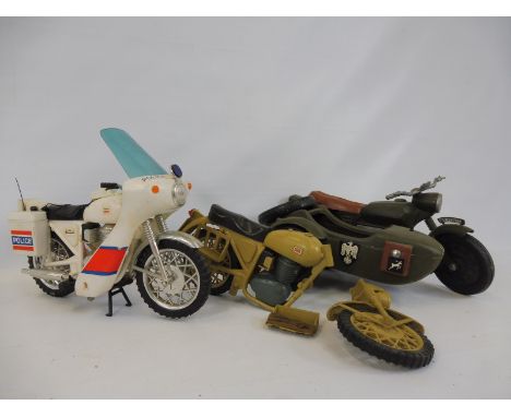 Three Action Man motorbikes, comprising a Dak incomplete, a German sidecar and a Police motorcycle, appearing complete.