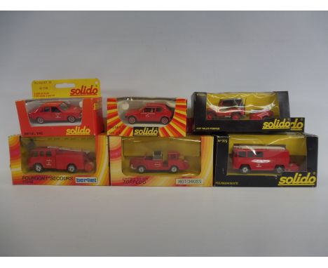 Six boxed Solido fire emergency vehicles, different scales to include a Willys Jeep and others.