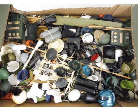 A large quantity of Action Man accessories to include guns, webbing, helmets etc.