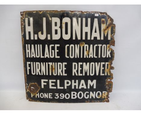 An enamel sign advertising H.J. Bonham, Haulage Contractor and Furniture Remover Felpham, Bognor, the sign made by Protector,