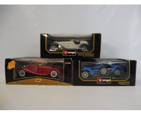 Three boxed Burago 1:18 scale comprising an Alfa Romeo Spider, a Bugatti Type 59 and a Mercedes K Type roadster.