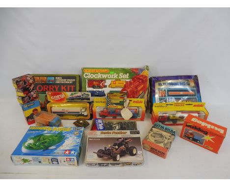 A quantity of commercial heavy haulers to include a Milton toy earth dumper, boxed, Corgi, Solido and others.