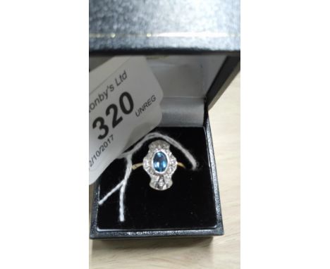 9 CT GOLD DIAMOND & TOPAZ RING
