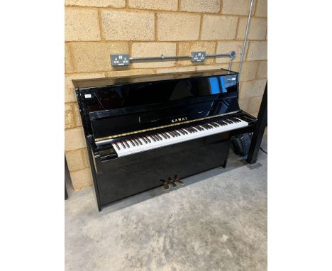 Kawai (c2015) A Model K-15 ATX upright piano in a modern style bright ebonised case; with a silent system.&nbsp;A condition r
