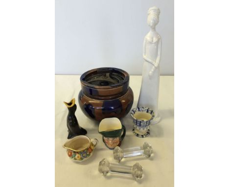 A ceramic tobacco jar with a small Royal Doulton character jug, a Spode figure Victoria, a blackbird pie funnel, a miniature 