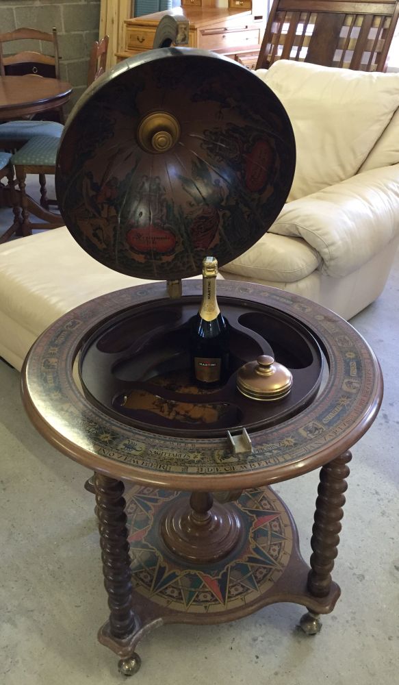 A Modern Globe Drinks Cabinet Includes Bottle Of Martini Prosecco