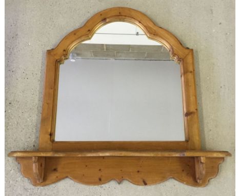 A pine hall mirror with shelf. 82cm wide and 82cm tall.