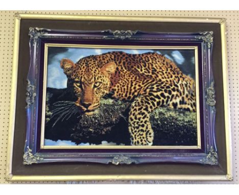 A framed Iranian carpet picture of a Leopard. Hand made in Tabriz, Iran 1999-2000. 50 knots per line (7cm) in 400 colours. Ca