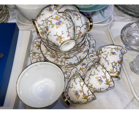 A 1950's Poole part dinner/tea service, 2 tone, 24 pieces approx; a 1930's 21 piece tea set by Royal Stafford; etc. 