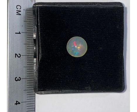 A circular cabochon cut opal, 2.20 carat 