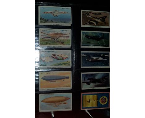 A selection of various vintage transport cigarette cards, including planes, ships, trains etc 