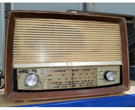 A BUSH bakelite brown mottled radio (one dial a.f); and an Ecko radio (a.f) 