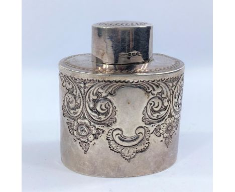 A silver tea caddy of oval form with reponsse? scrollwork, Sheffield 1899; 2.6oz 