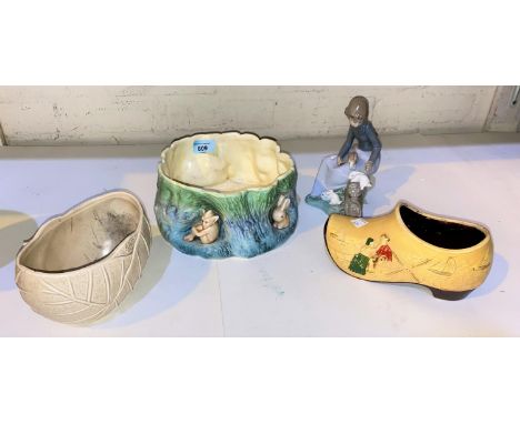 A Sylvac bowl in the form of a tree base decorated with rabbits and fairies numbered 1614, a Nao figure of a girl with rabbit