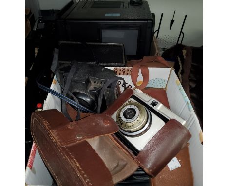 A selection of vintage cameras and accessories 