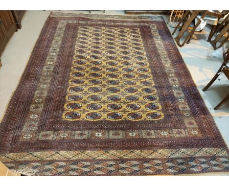 A modern hand knotted Pakistan Bokhara carpet with fawn ground, 340 x 256 cm 