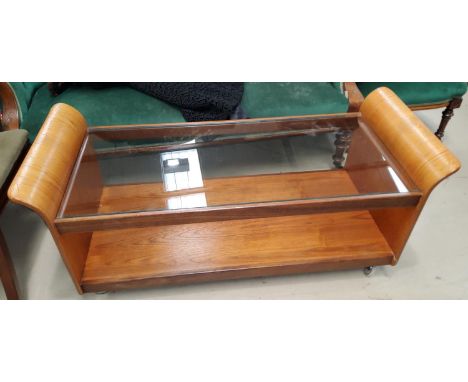 A mid 20th century G-plan teak 'Lotus' coffee table with glass top and solid shelf under