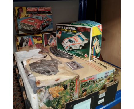 Five originally boxed vintage Radio controlled vehicles, including a Radio Shack Sherman Tank etc 