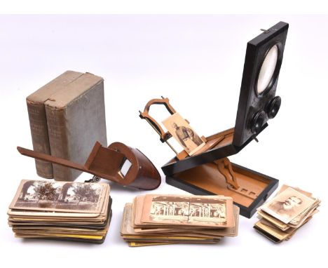 A Stereoscopic Viewer and quantity of cards. Ebonised viewer with stereo and mono lenses, engraved 'Souvenir de Paris'. Toget
