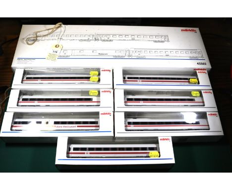 8 Marklin HO gauge items. A DB 4-coach Wagen-Set Neue InterCity-Farben (43302). In red and grey livery, including a Restauran