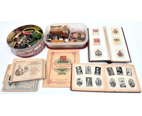 A quantity of Postcards, Cigarette cards, etc. Including; a Postcard album of late 19th/early 20th Century embroidered postca