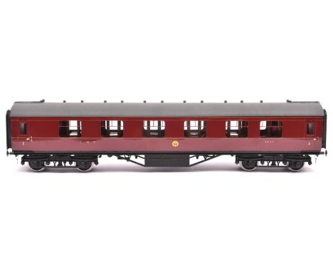 A Gauge One Tenmille Products kit built LMS Full First corridor coach with tables, 1045, in lined maroon livery. A well const
