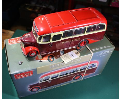 A Sun Star 1:24 scale Bedford OB Coach. In maroon and red Hants &amp; Sussex livery. Boxed with certificate. Coach VGC, one b