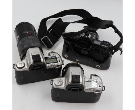 Three Minolta autofocus cameras with autofocus lenses. Not available for in-house P&amp;P 