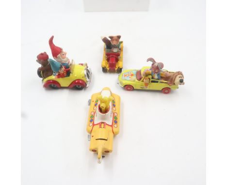 Vintage Corgi noddy cars, Corgi Basil Brush's car, Corgi Magic roundabout car and Corgi The Beatles yellow submarine. Not ava