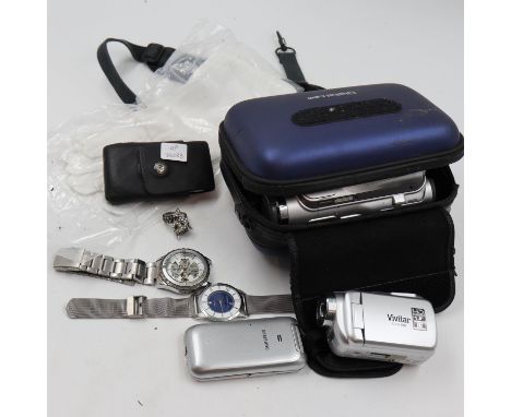 Samsung digital video camera, cased, with a Vivitar video camera, two mobile phones, two dress watches and a fox-form stone s