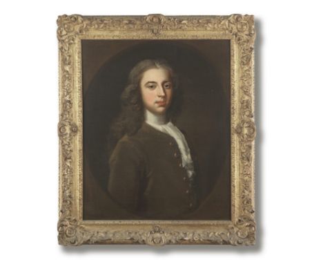 Enoch Seeman (Danzig circa 1694-1745 London)Portrait of a gentleman, half-length, in a green coat, within a painted oval sign